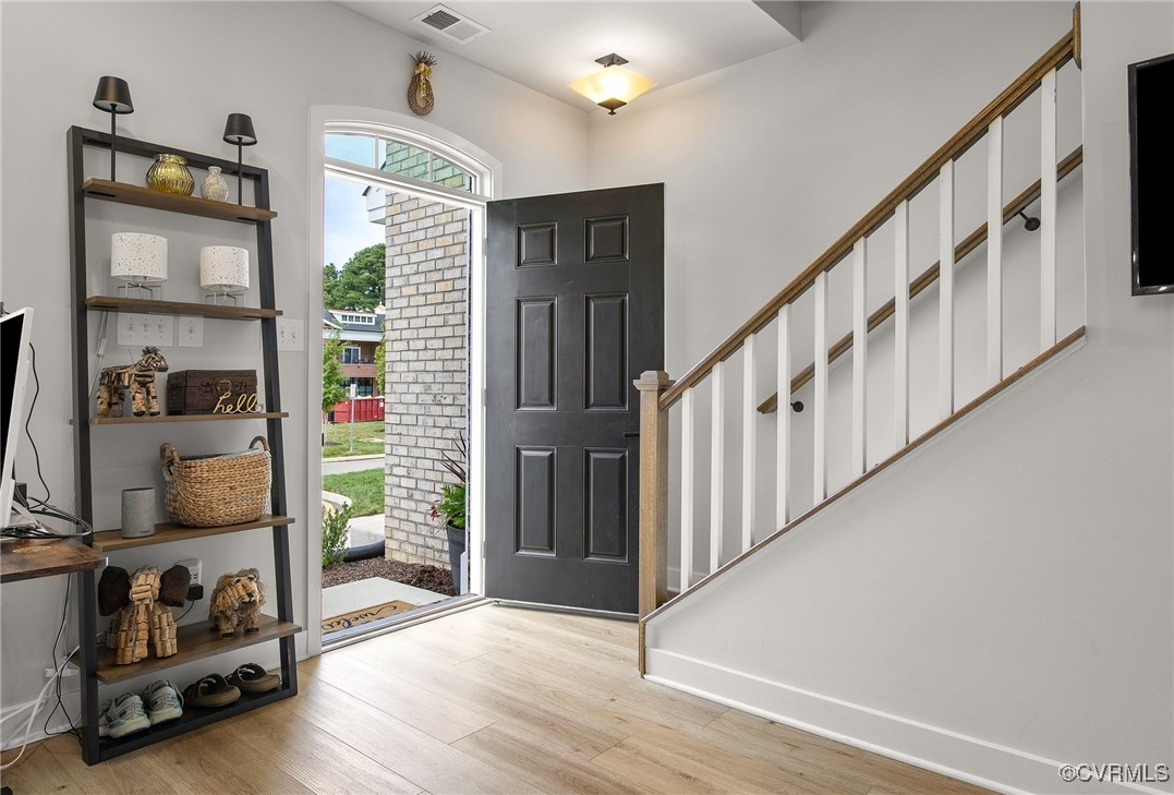 1321 Ewing Pk Loop Midlothian, VA 23113 - Photo 5 of 30 a view of an entryway with wooden floor and windows