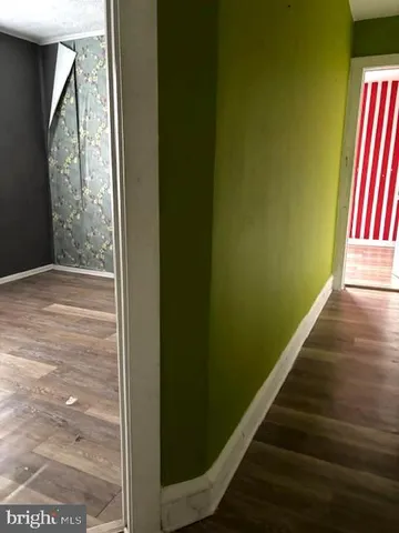 a view of balcony and wooden floor