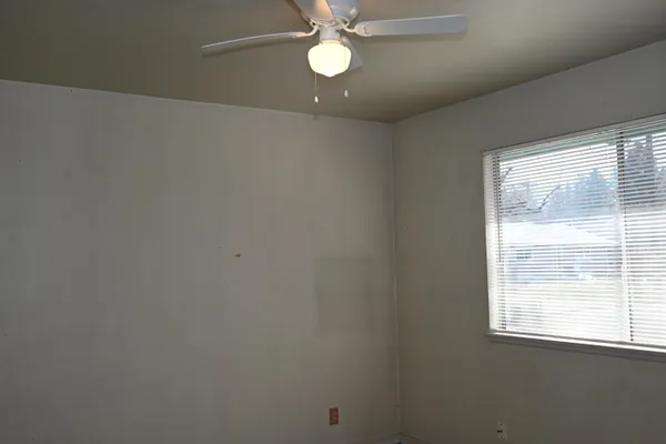 a view of a livingroom with a window