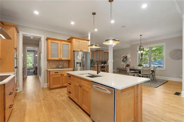 a bedroom with a bed and a painting on the wall