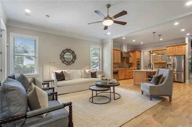 a view of staircase with railing and white walls