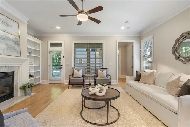 a spacious bedroom with a bed and a fireplace