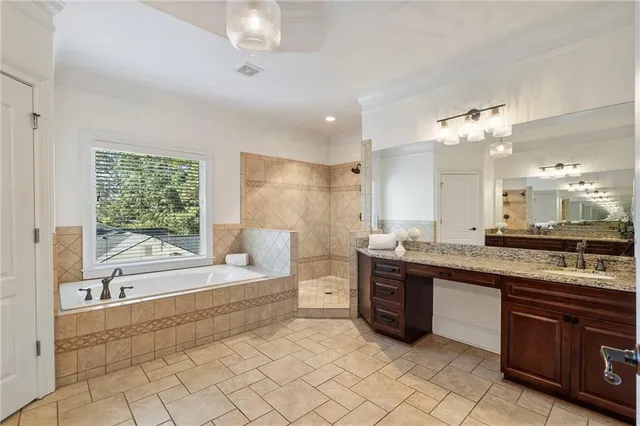 a view of a backyard with table and chairs