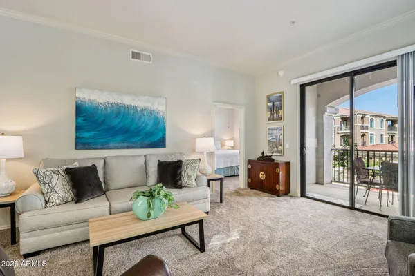 a living room with furniture and a couch