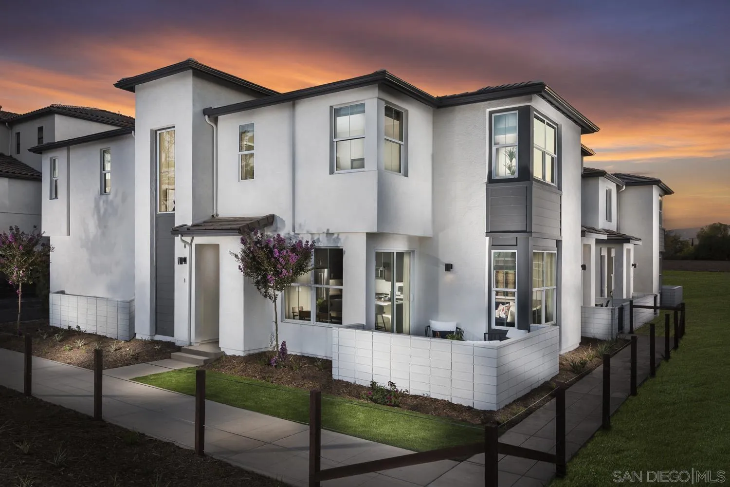 13075 Olympus Circle, Unit 1 Poway, CA 92064 - Photo 12 of 16 a front view of a house with a chairs and table in kitchen