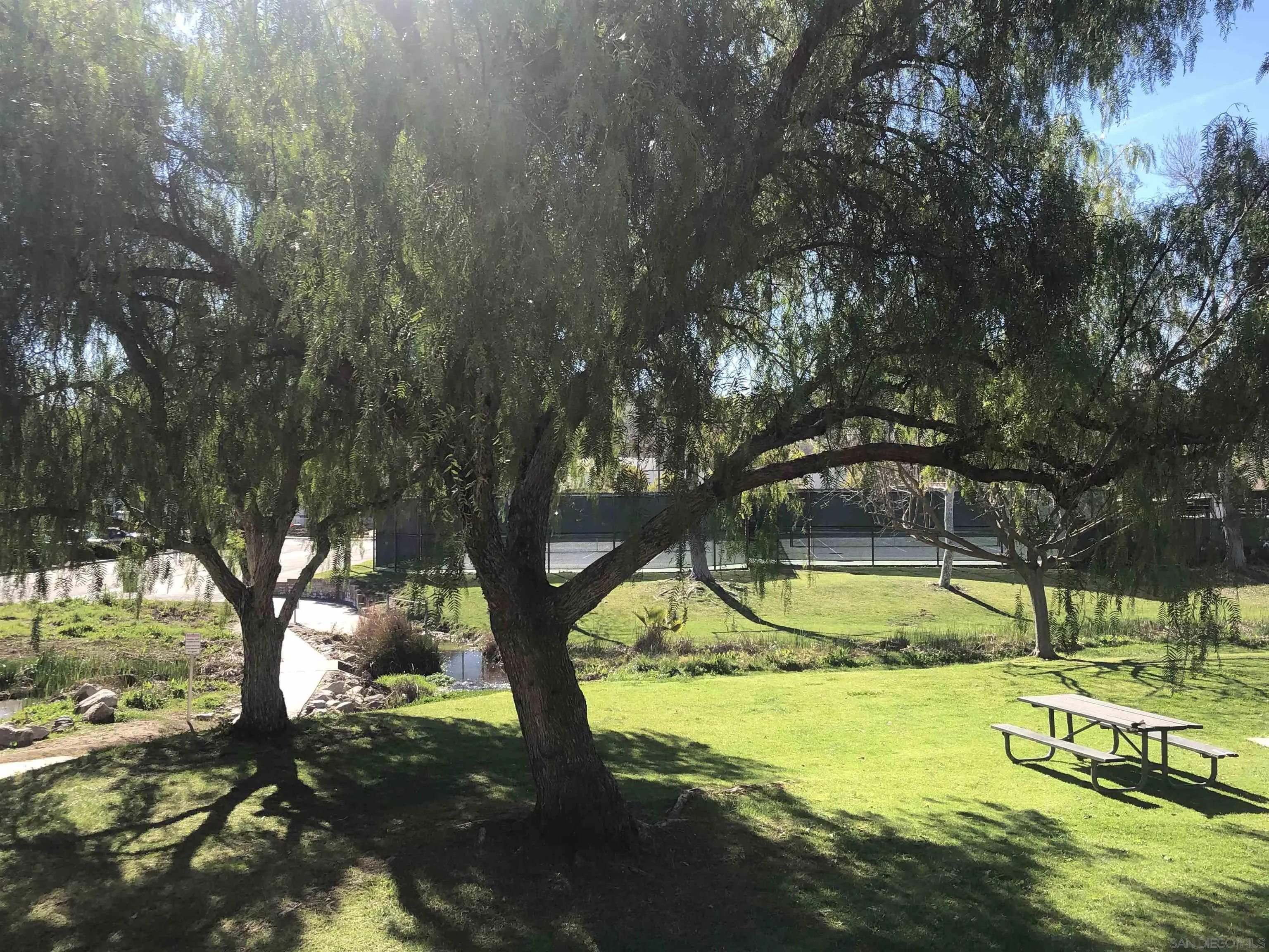 13075 Olympus Circle, Unit 1 Poway, CA 92064 - Photo 16 of 16 a view of swimming pool with deck and a backyard