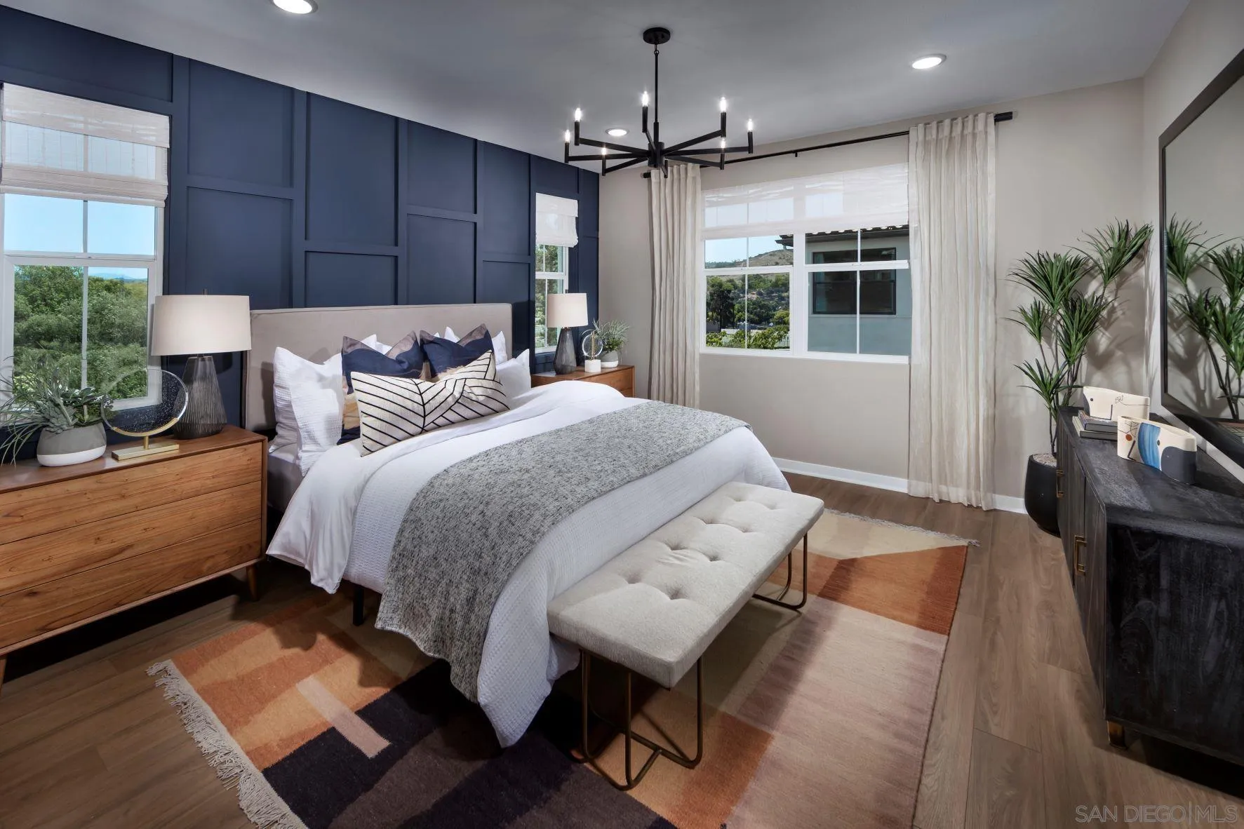 13075 Olympus Circle, Unit 1 Poway, CA 92064 - Photo 9 of 16 a bed room with a bed window and potted plant