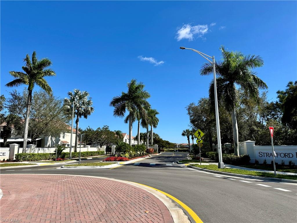 912 Hampton Circle, Unit 92 Naples, FL 34105 - Photo 22 of 30 a view of road and with palm trees