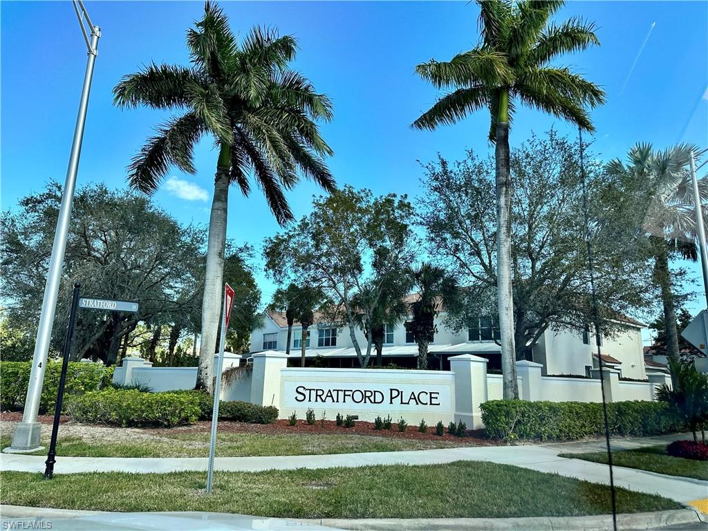 912 Hampton Circle, Unit 92 Naples, FL 34105 - Photo 23 of 30 a sign board with palm trees