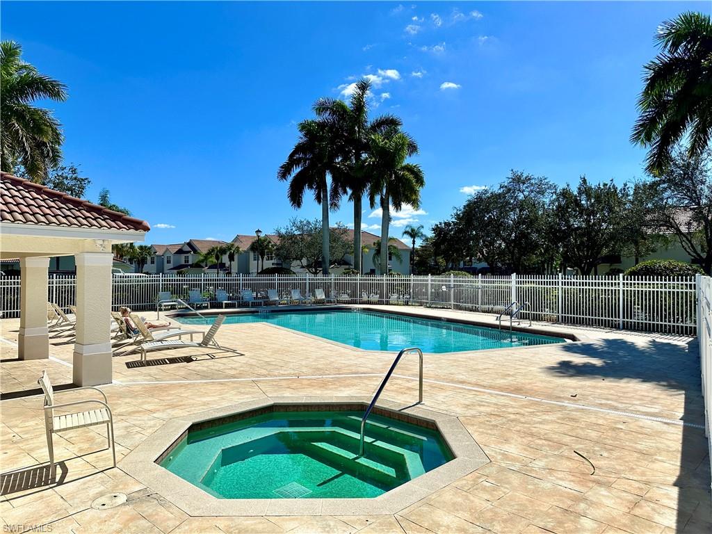 912 Hampton Circle, Unit 92 Naples, FL 34105 - Photo 27 of 31 Community pool with a patio, a community hot tub, and a gazebo