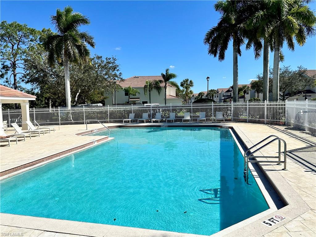912 Hampton Circle, Unit 92 Naples, FL 34105 - Photo 28 of 31 Community pool featuring a patio area