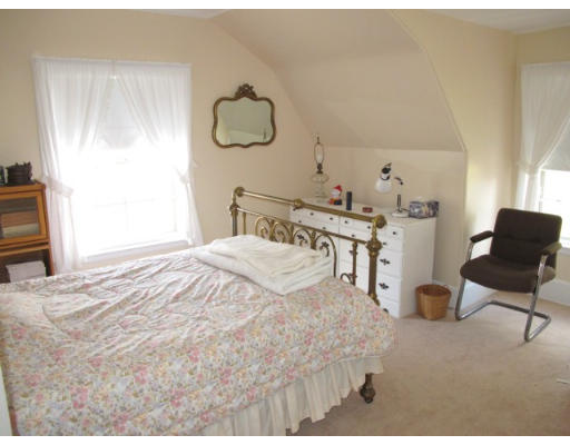 67 Buckminster Road Brookline, MA 02445 - Photo 5 of 11 a bedroom with a bed and furniture