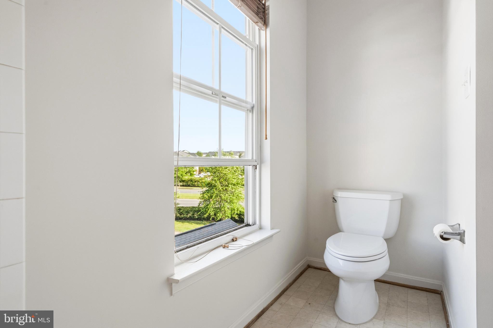 9227 Ribbon Falls Loop Bristow, VA 20136 - Photo 52 of 53 a bathroom with a toilet