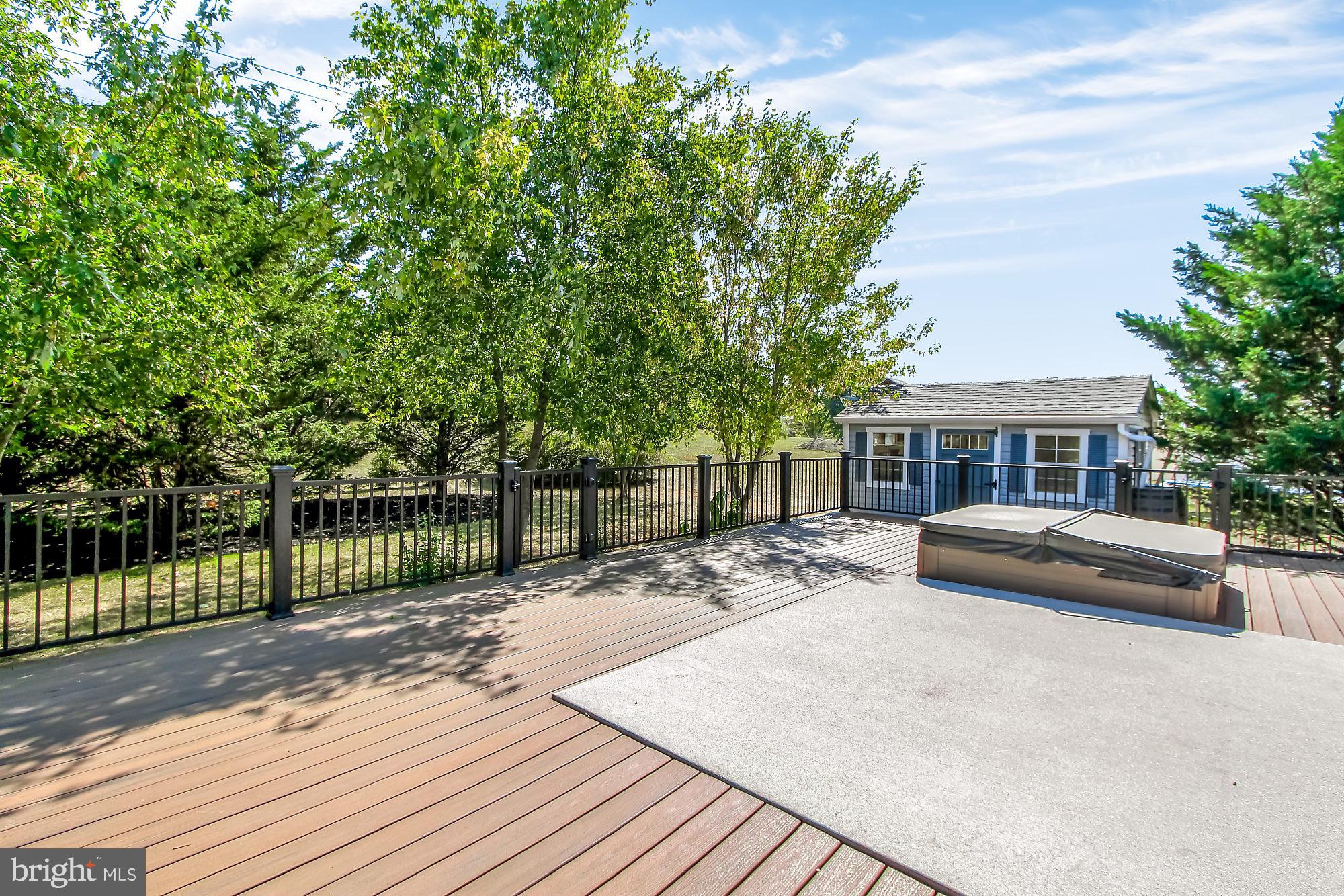 1170 Saddleback Road York, PA 17408 - Photo 24 of 31 Side View of Composite Decking w/ Hot Tub
