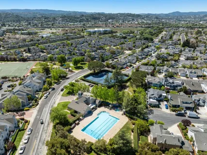 an aerial view of a city with lots of residential buildings