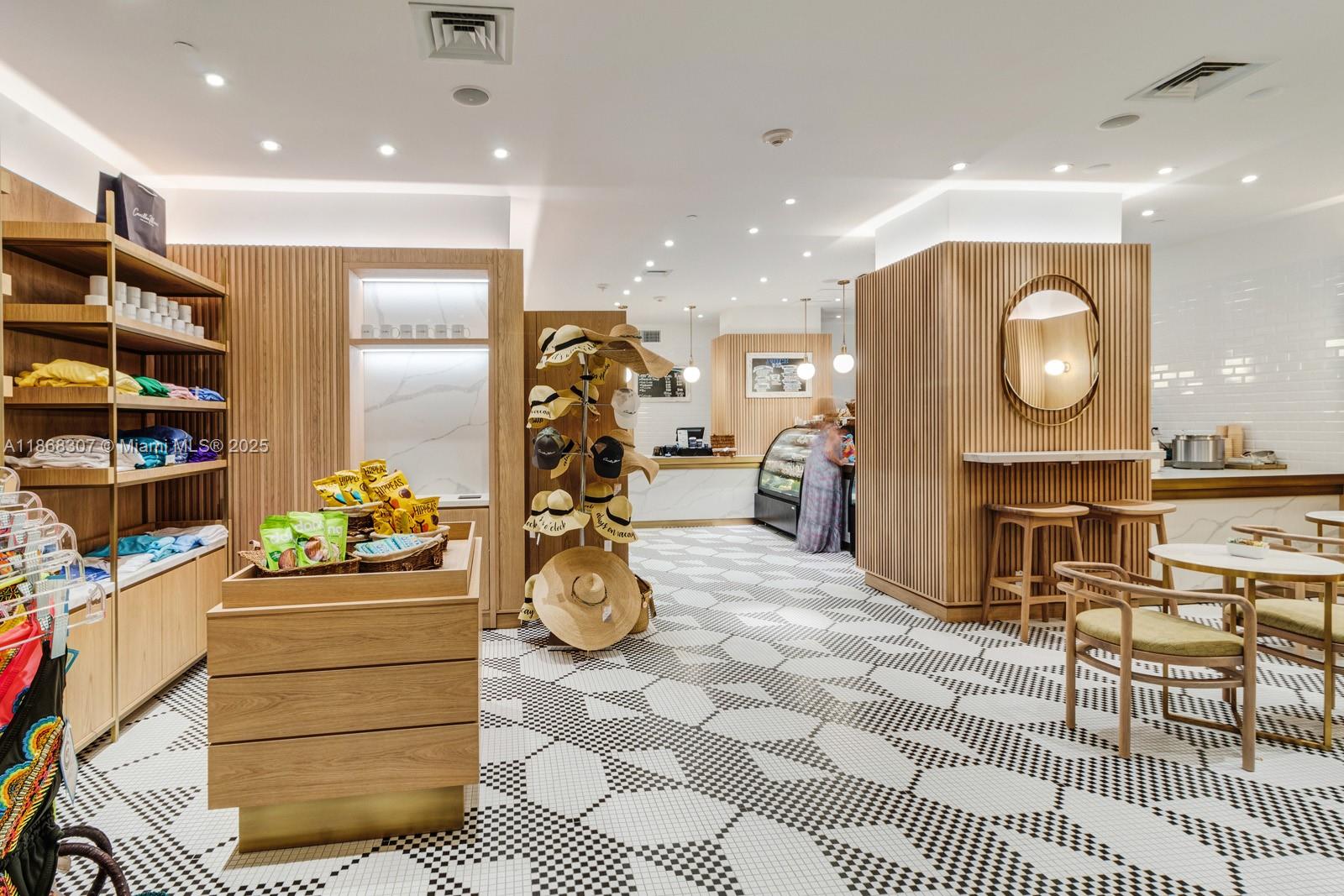 6899 Collins Avenue, Unit 1010 Miami Beach, FL 33141 - Photo 32 of 37 a room with furniture a flat screen tv and a fireplace