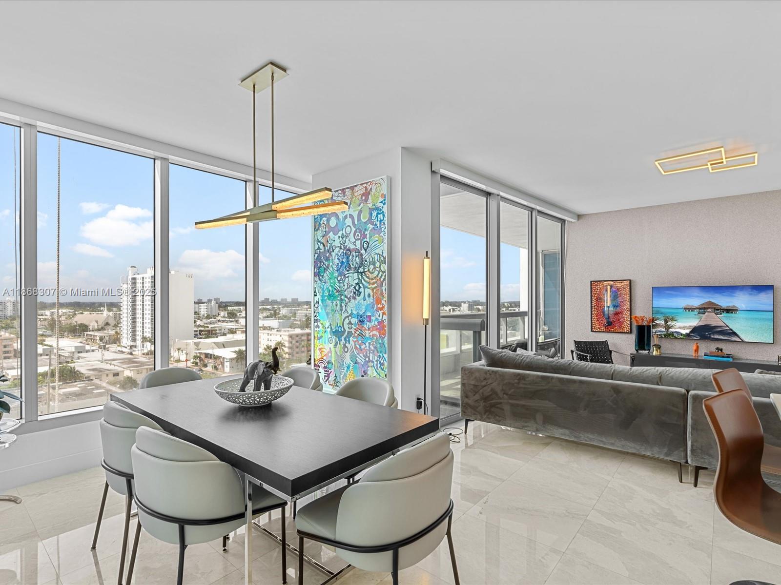 6899 Collins Avenue, Unit 1010 Miami Beach, FL 33141 - Photo 10 of 37 a view of a dining room with furniture window and outside view