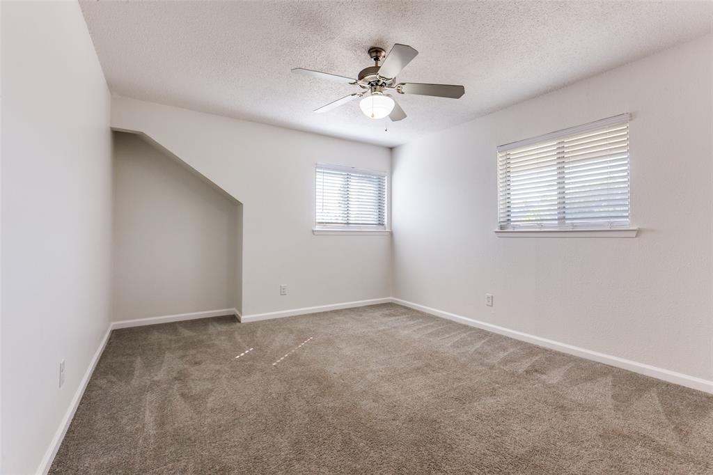 110 Ocean Drive Richardson, TX 75081 - Photo 11 of 20 a view of an empty room with a window