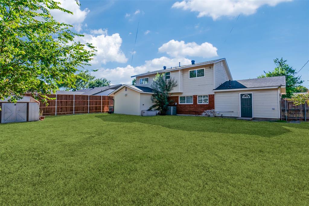 110 Ocean Drive Richardson, TX 75081 - Photo 14 of 20 a view of a yard with a house