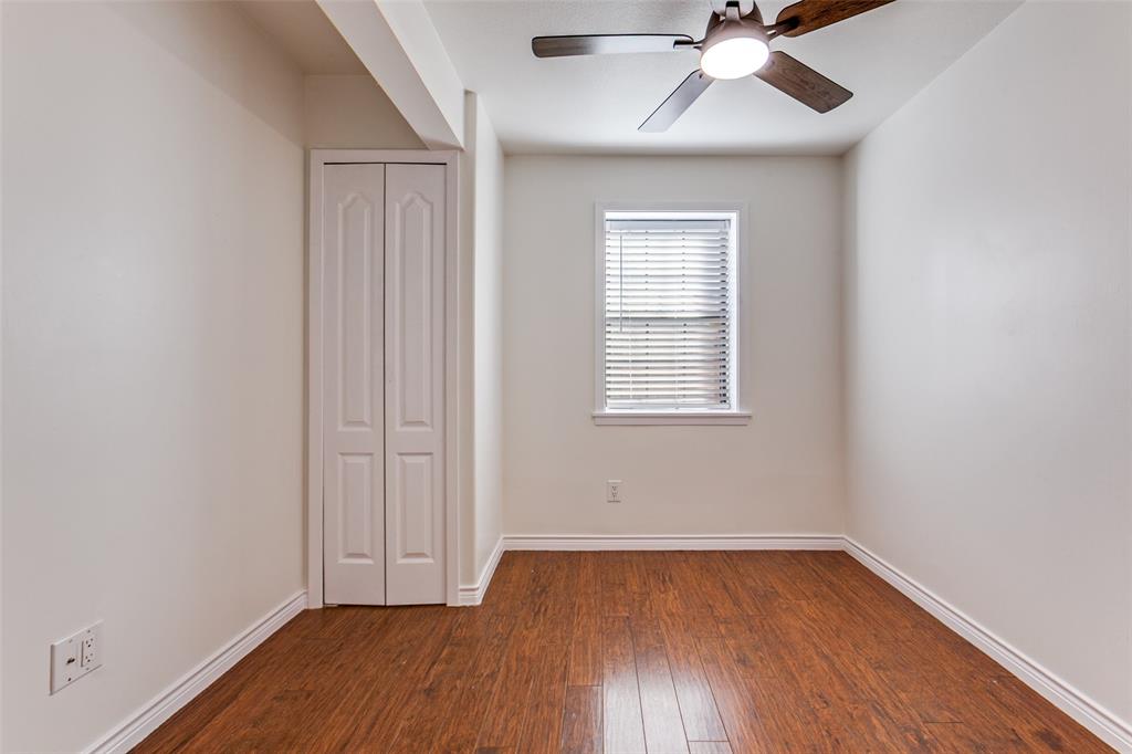 110 Ocean Drive Richardson, TX 75081 - Photo 18 of 20 an empty room with a hardwood and ceiling fan