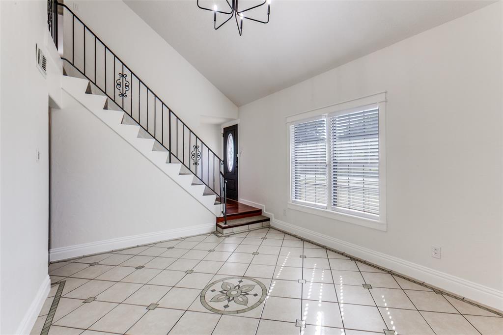 110 Ocean Drive Richardson, TX 75081 - Photo 2 of 20 a view of an entryway with wooden floor