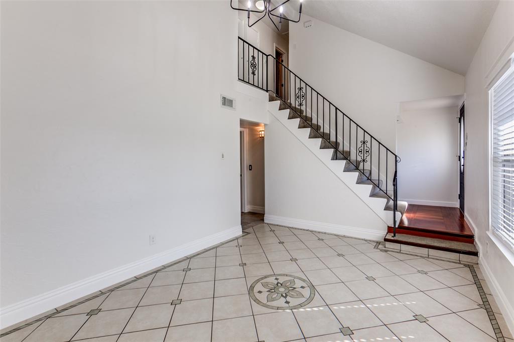 110 Ocean Drive Richardson, TX 75081 - Photo 3 of 20 a view of an entryway with wooden floor