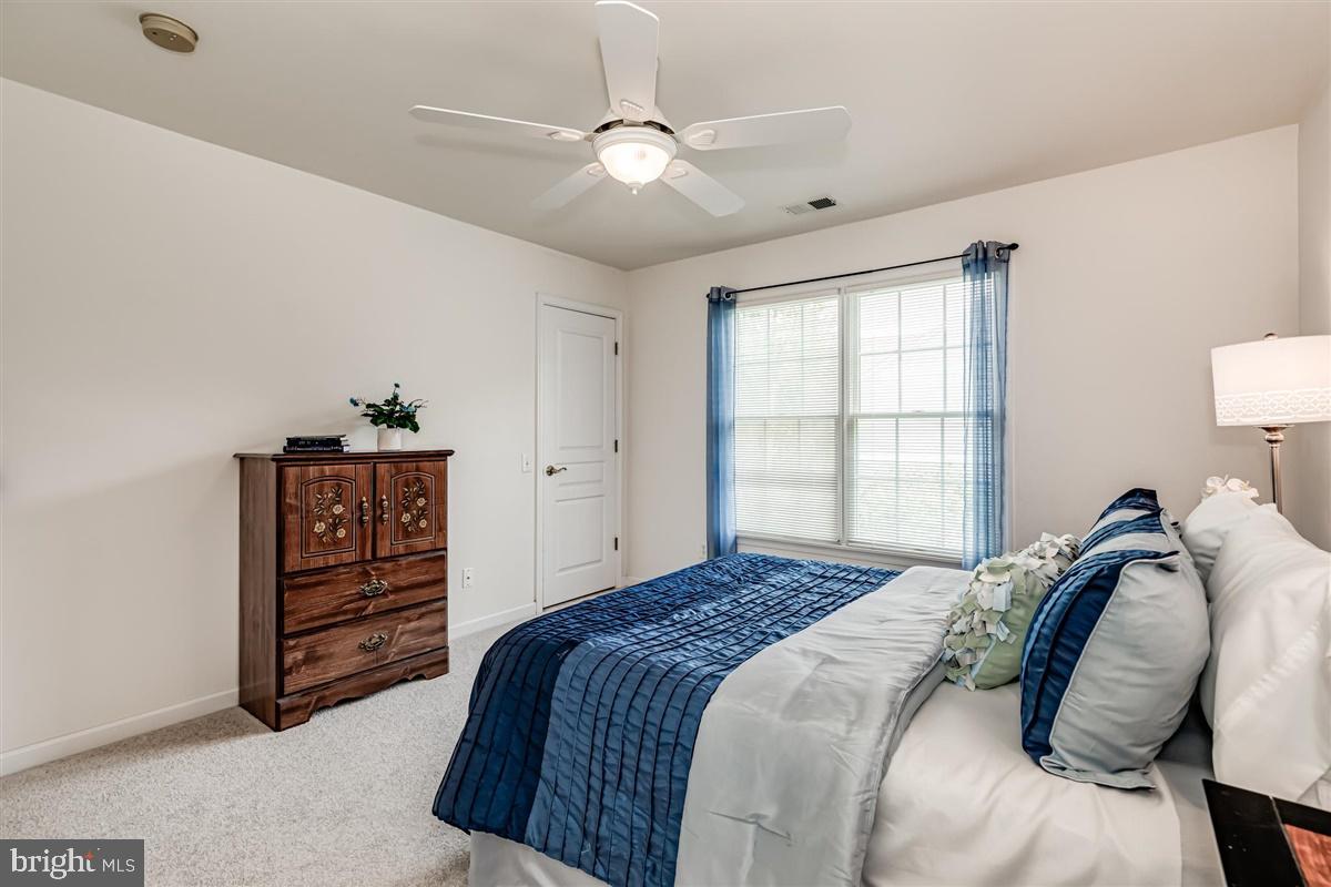 10 Maidenhead Road Princeton, NJ 08540 - Photo 22 of 31 a bedroom with a bed and a dresser