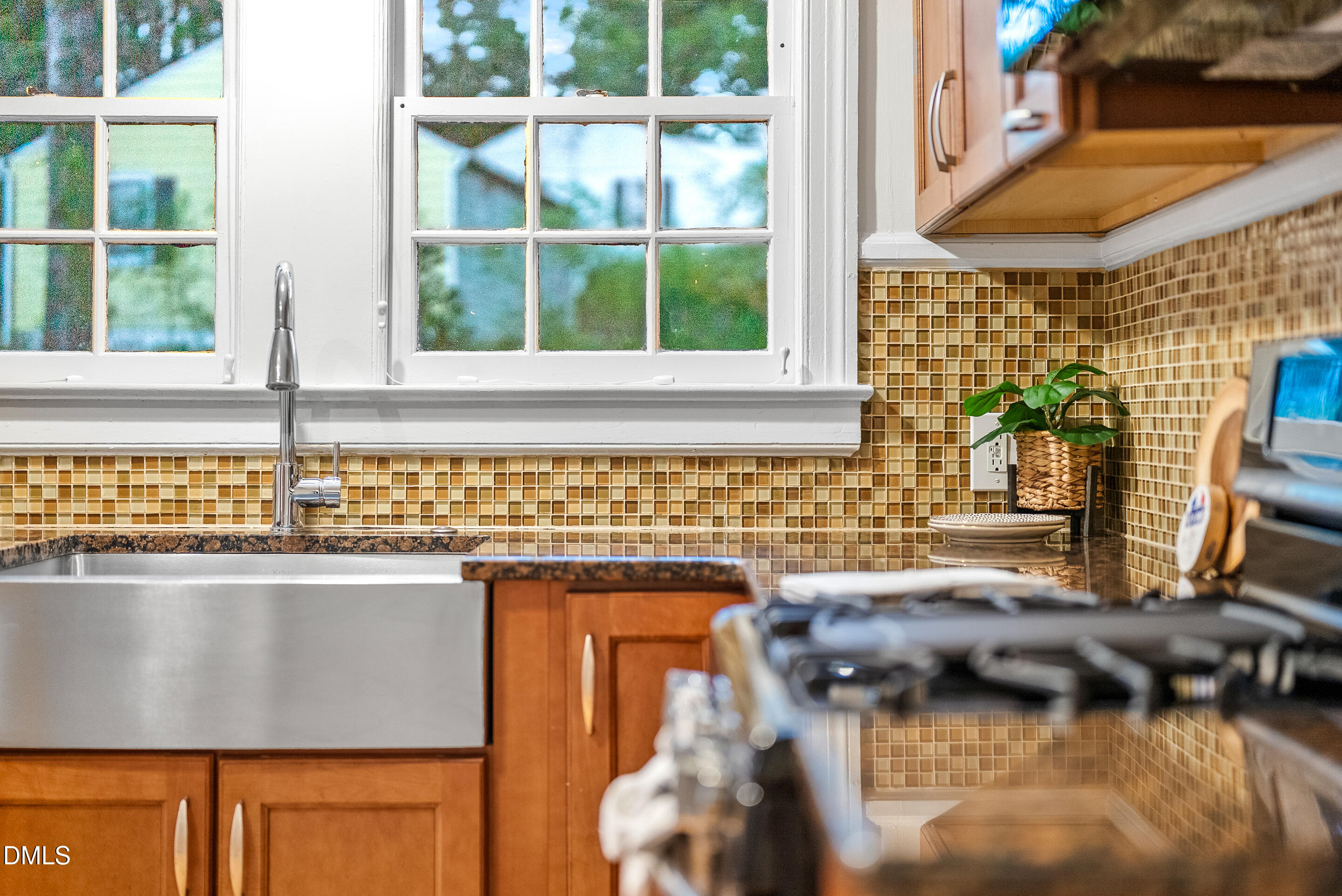 1702 James Street Durham, NC 27707 - Photo 12 of 21 a kitchen with a sink and a stove