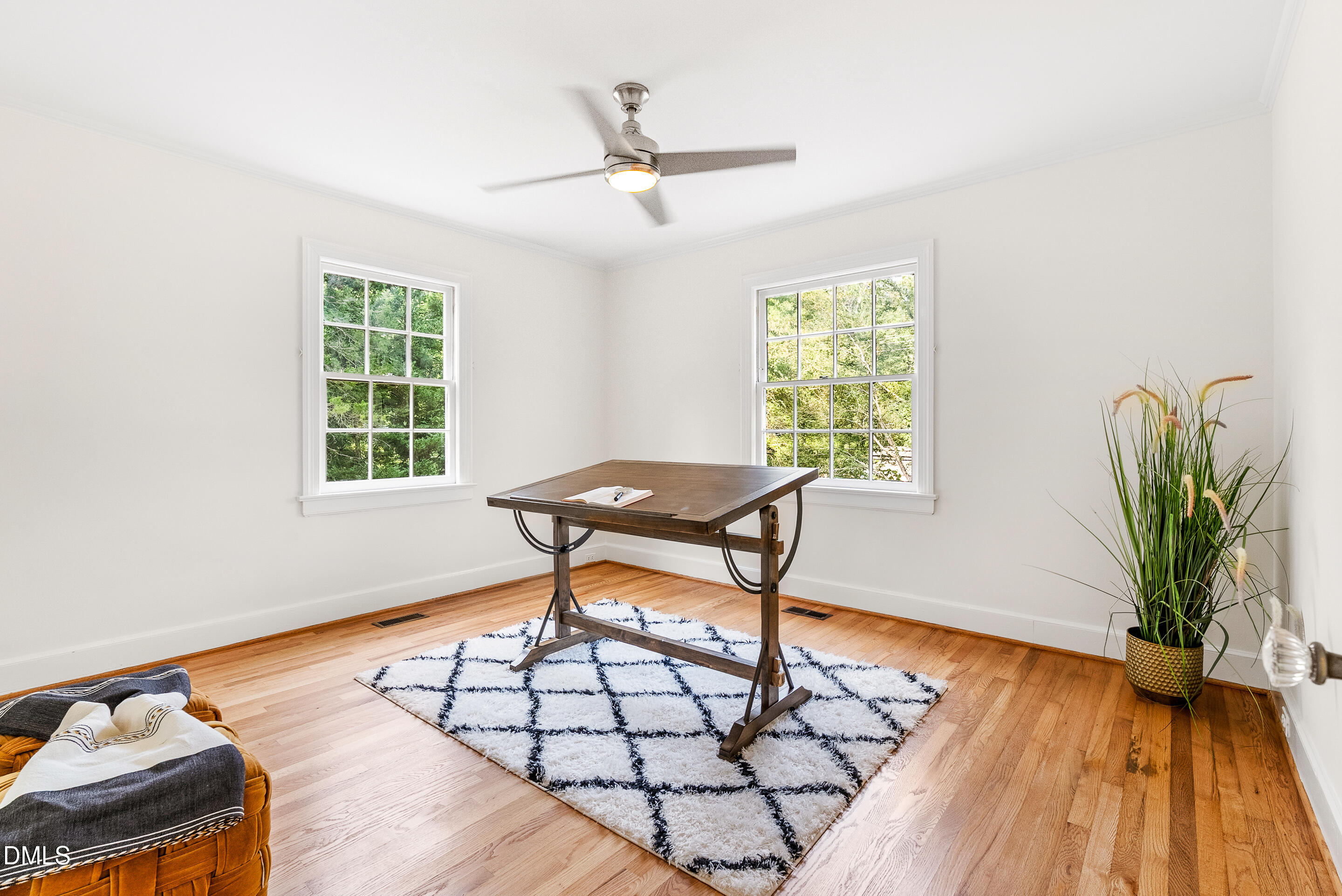 1702 James Street Durham, NC 27707 - Photo 15 of 21 a work room with furniture and a window