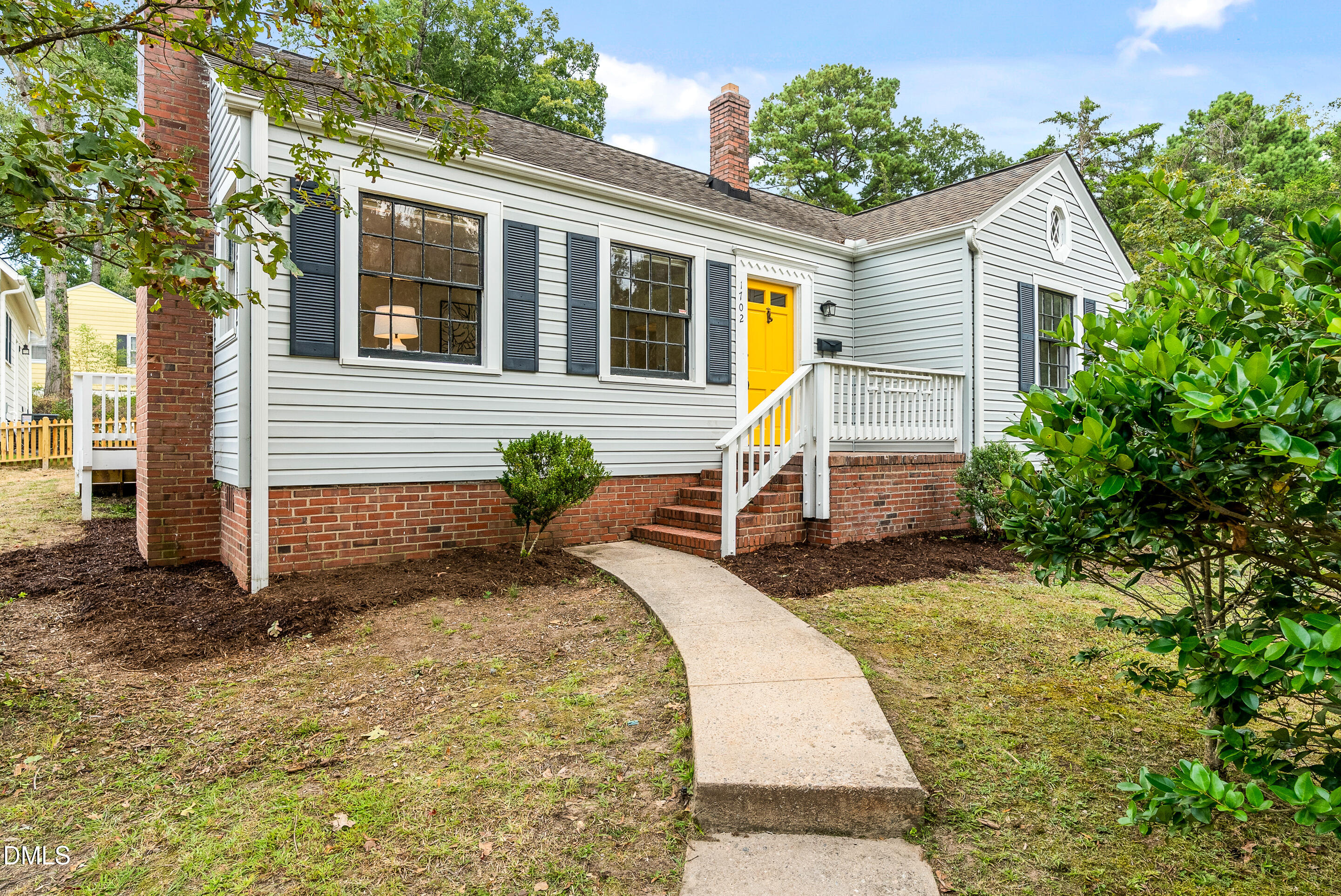 1702 James Street Durham, NC 27707 - Photo 2 of 21 a front view of a house with garden