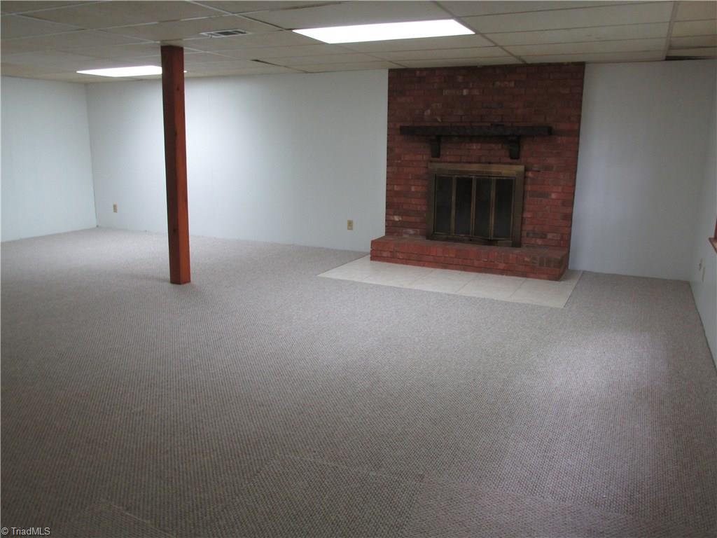 2303 Dover Place High Point, NC 27265 - Photo 14 of 17 New carpet in den. Huge space.