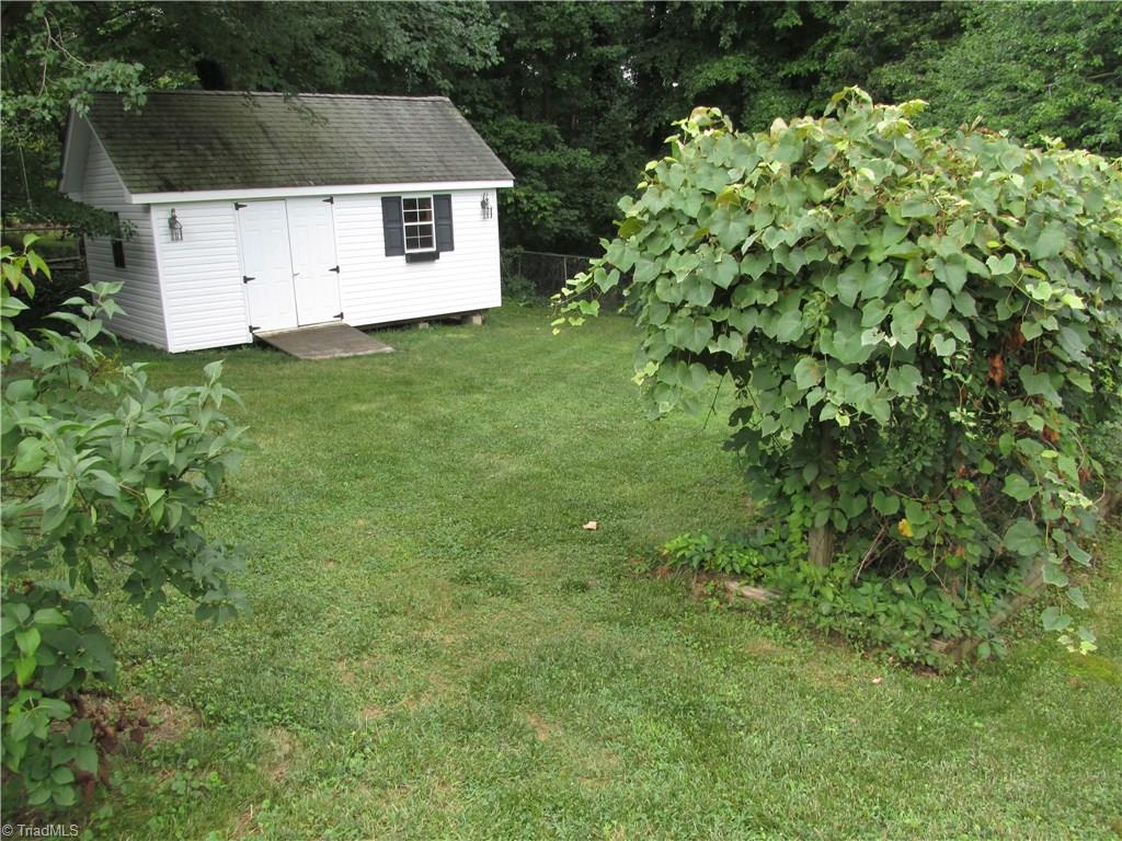 2303 Dover Place High Point, NC 27265 - Photo 16 of 17 beautiful backyard...totally fenced. Great workshop.