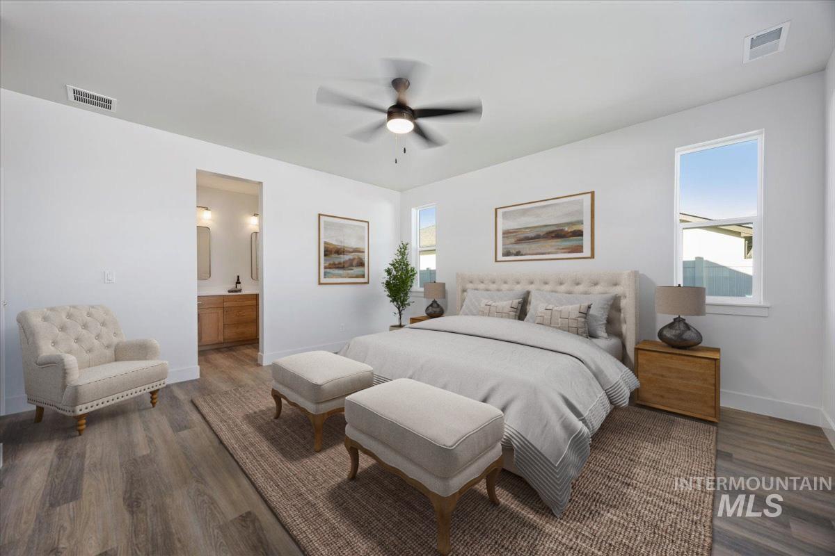 178 Maxine Lane, Unit HOMESITE 204 Kimberly, ID 83341 - Photo 14 of 24 Bedroom with ceiling fan, wood looking finished floors, and connected bathroom with dual vanity and huge walk in closet