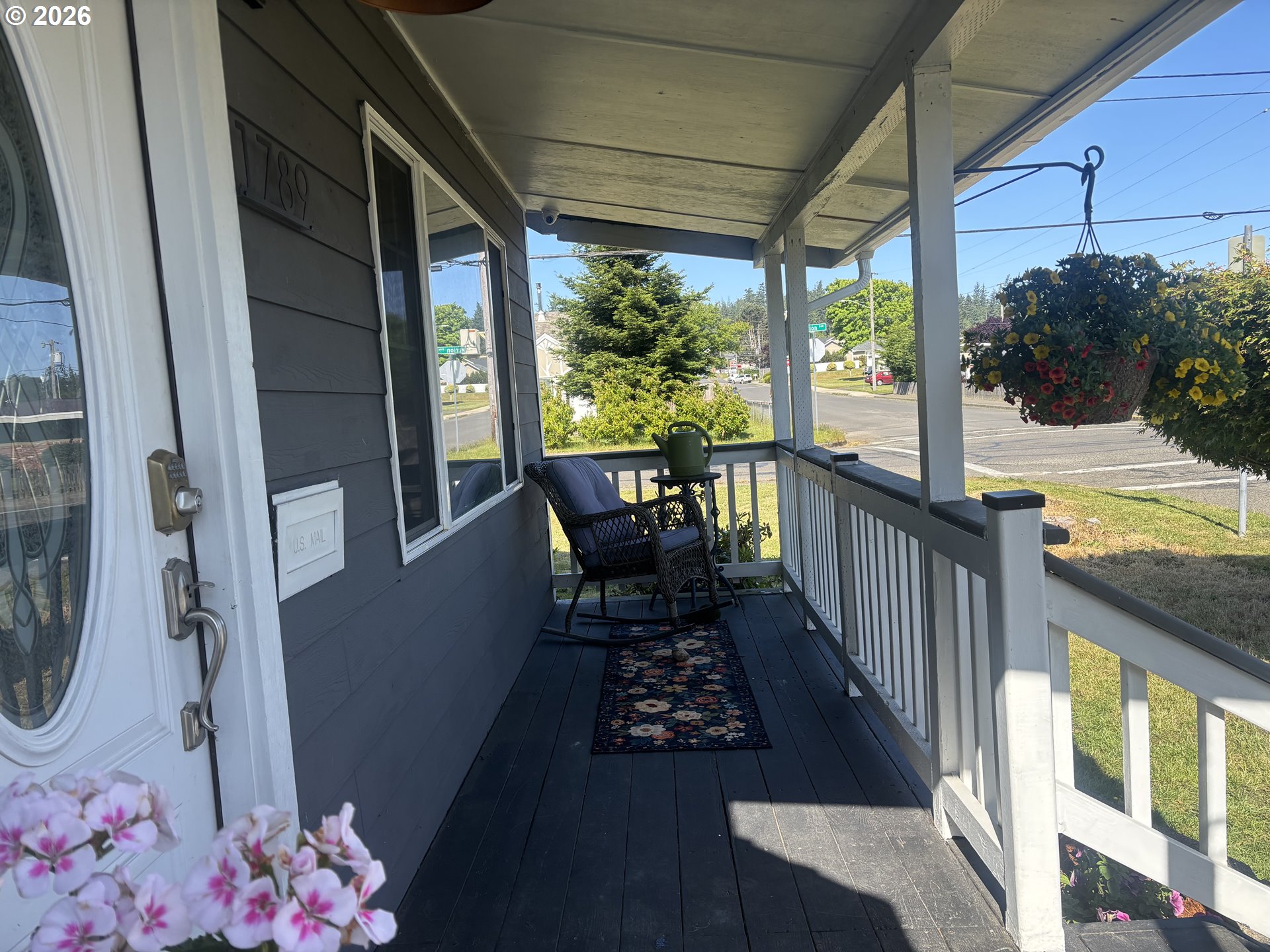 1789 14th Street North Bend, OR 97459 - Photo 5 of 43 a view of two chairs in the balcony