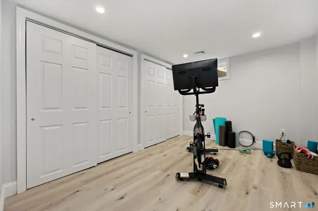 a room with a sink and gym equipment