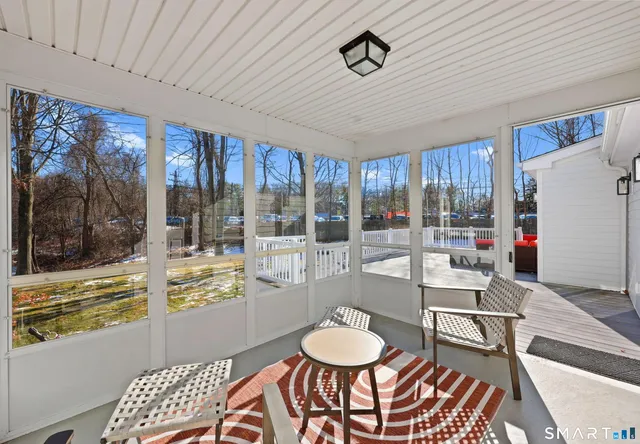 a room with furniture and a window