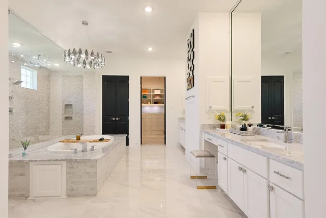 a bathroom with a double vanity sink mirror and double