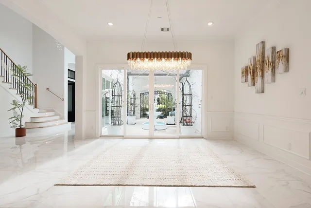 a view of a hallway with a large window