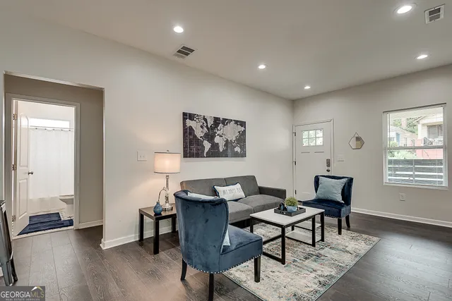 a workspace with furniture and a window