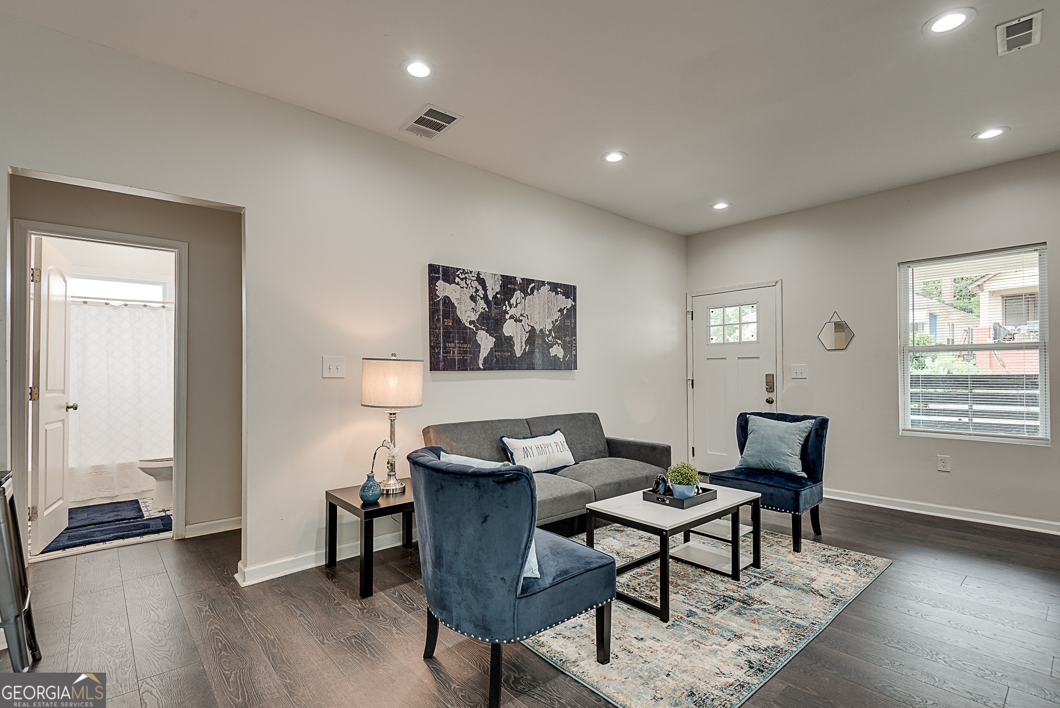 996 Fair Street Southwest Atlanta, GA 30310 - Photo 2 of 8 a workspace with furniture and a window