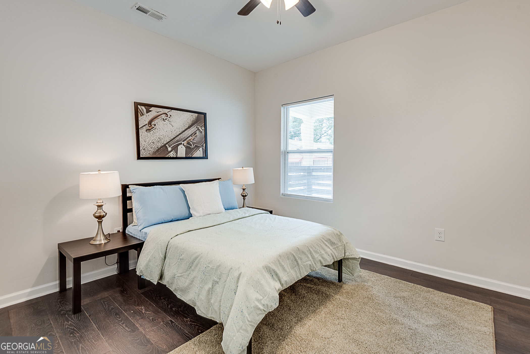 996 Fair Street Southwest Atlanta, GA 30310 - Photo 6 of 8 a bedroom with a bed and a window