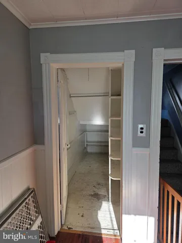 a bathroom with a glass door shower