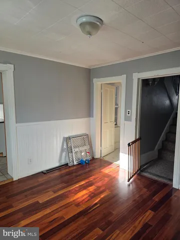 a view of livingroom with furniture and wooden floor