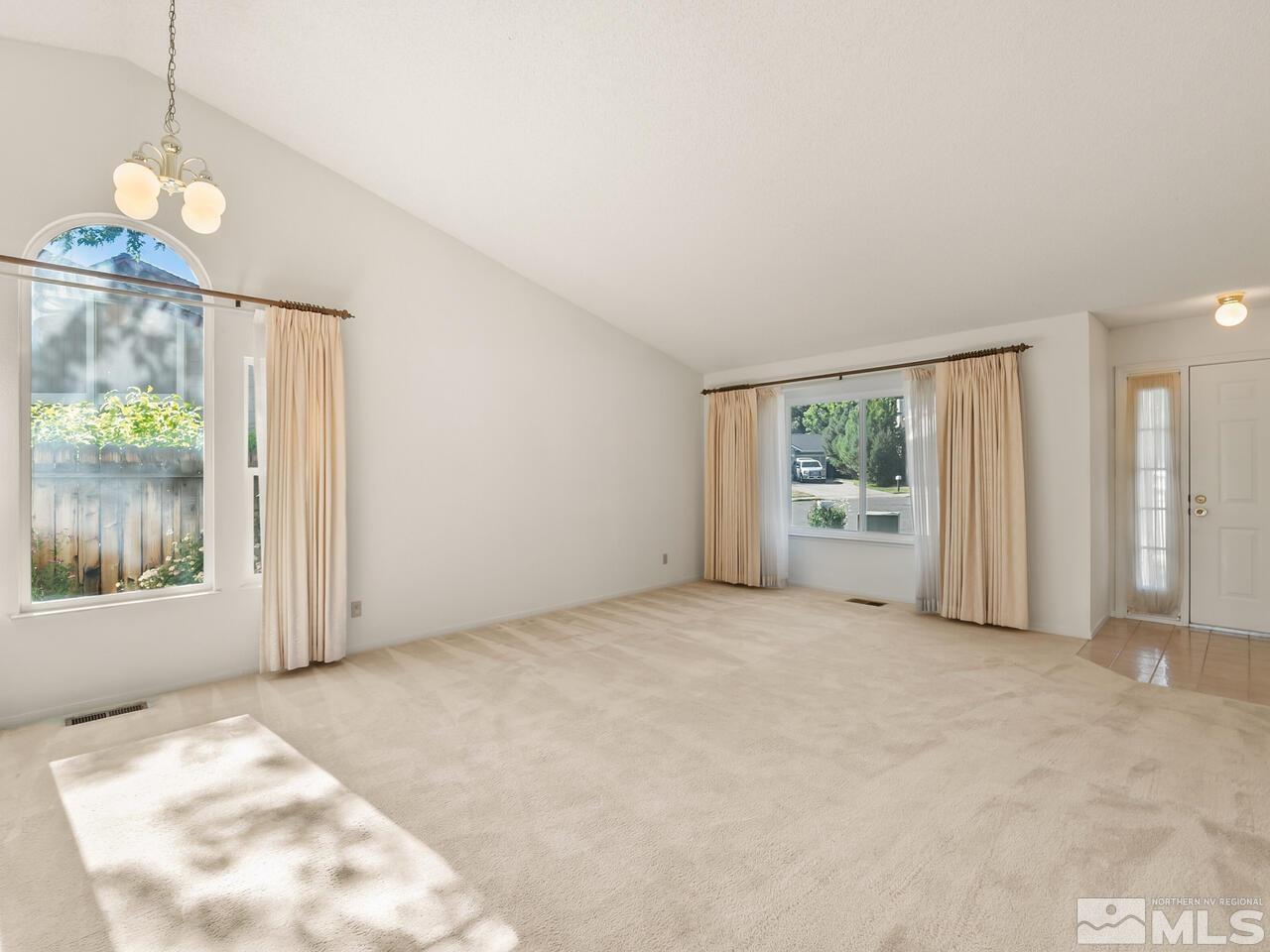 5670 West Rainbow Ridge Court Reno, NV 89523 - Photo 24 of 36 a view of an empty room with a window