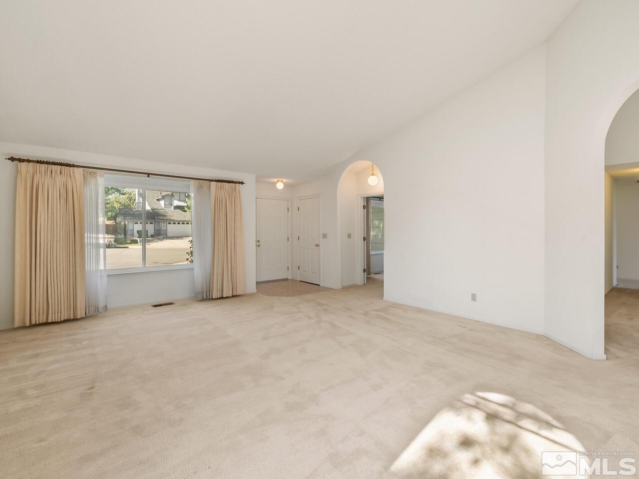5670 West Rainbow Ridge Court Reno, NV 89523 - Photo 26 of 36 a view of an empty room with a window