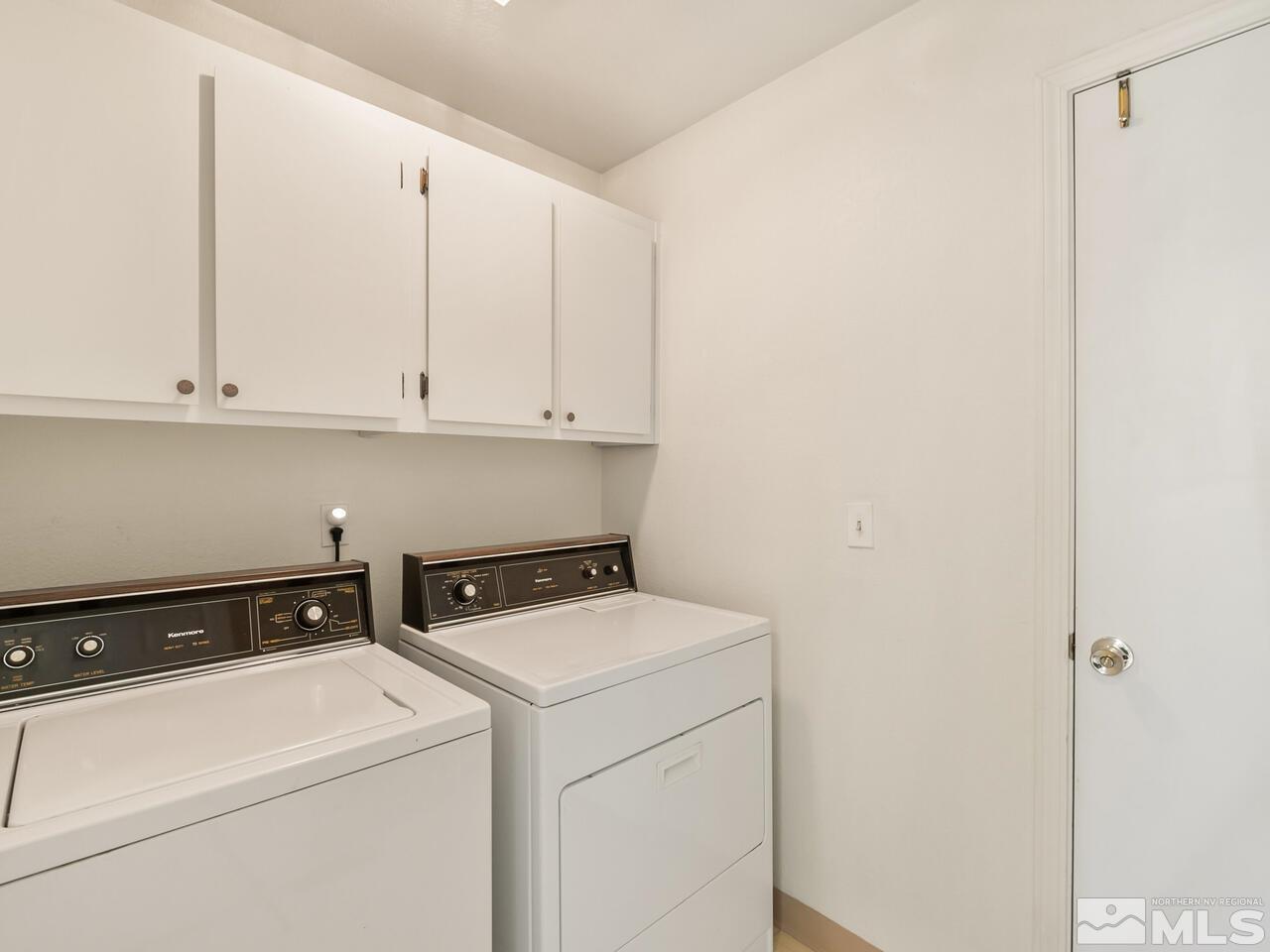 5670 West Rainbow Ridge Court Reno, NV 89523 - Photo 34 of 36 a utility room with dryer and washer