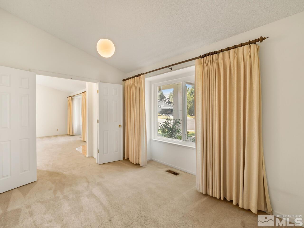 5670 West Rainbow Ridge Court Reno, NV 89523 - Photo 36 of 36 a view of an empty room with a window