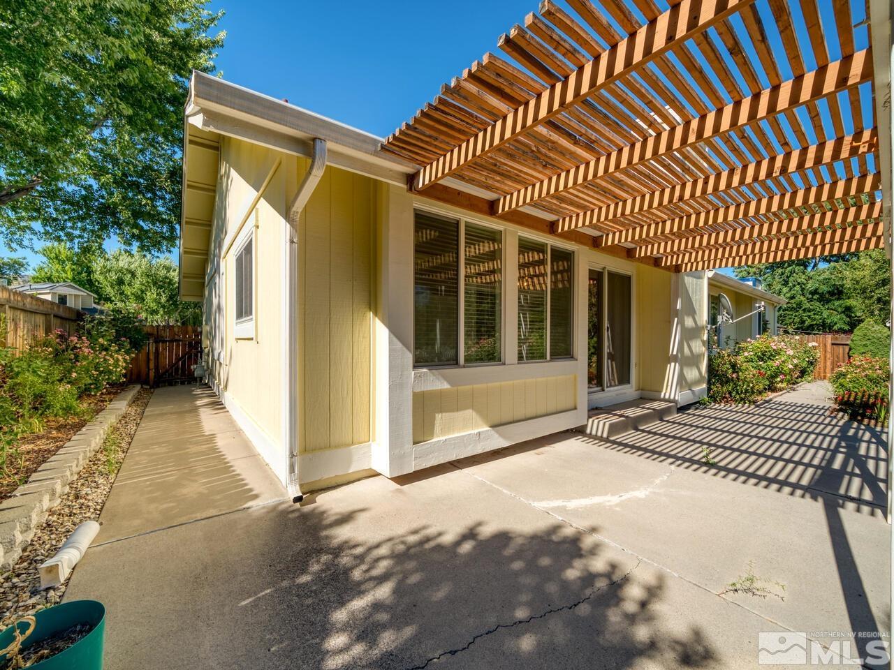 5670 West Rainbow Ridge Court Reno, NV 89523 - Photo 5 of 36 a view of a house with a patio