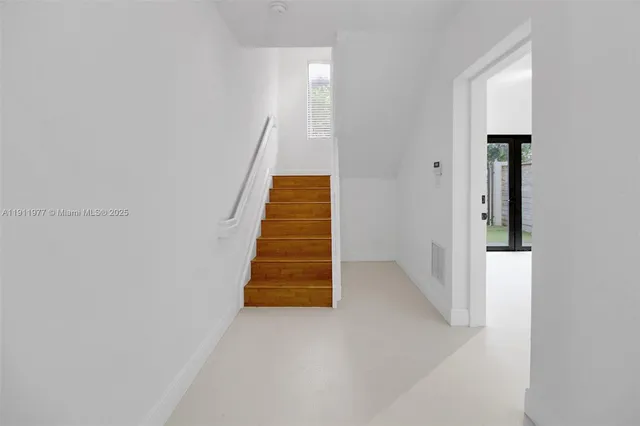 an entryway of a house with hallway