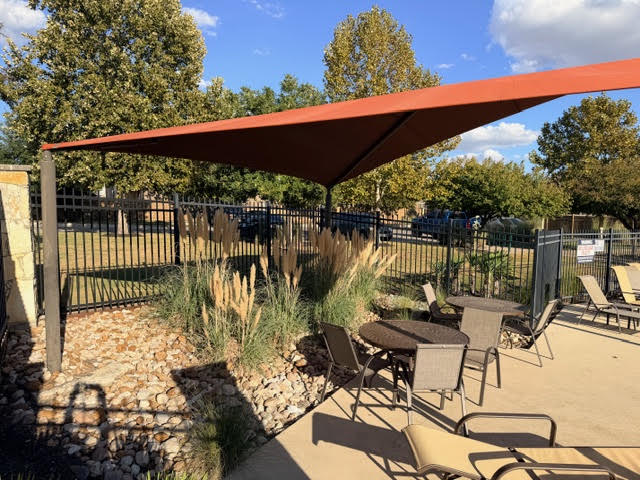 329 Los Cobos Lane Georgetown, TX 78626 - Photo 34 of 40 a view of a chairs and table in patio